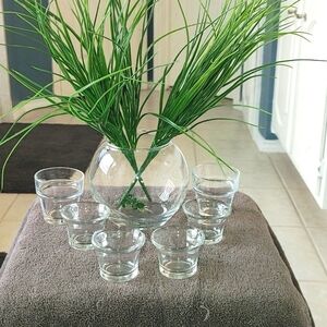 Glass votives/water planters 3 sizes. Total of 7.  Some used, some like new.